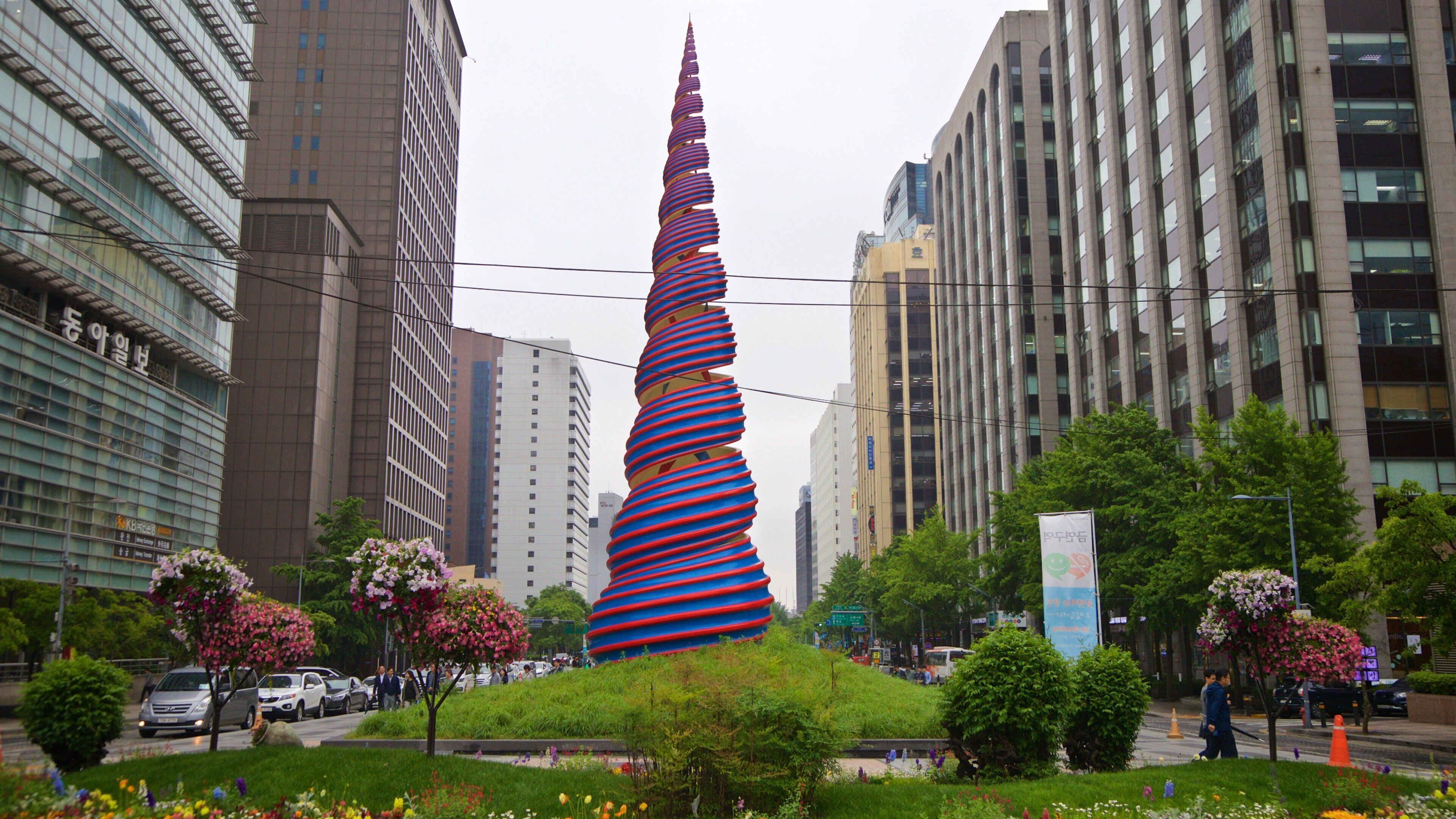 Cheonggye Plaza featuring a park, outdoor art and a city