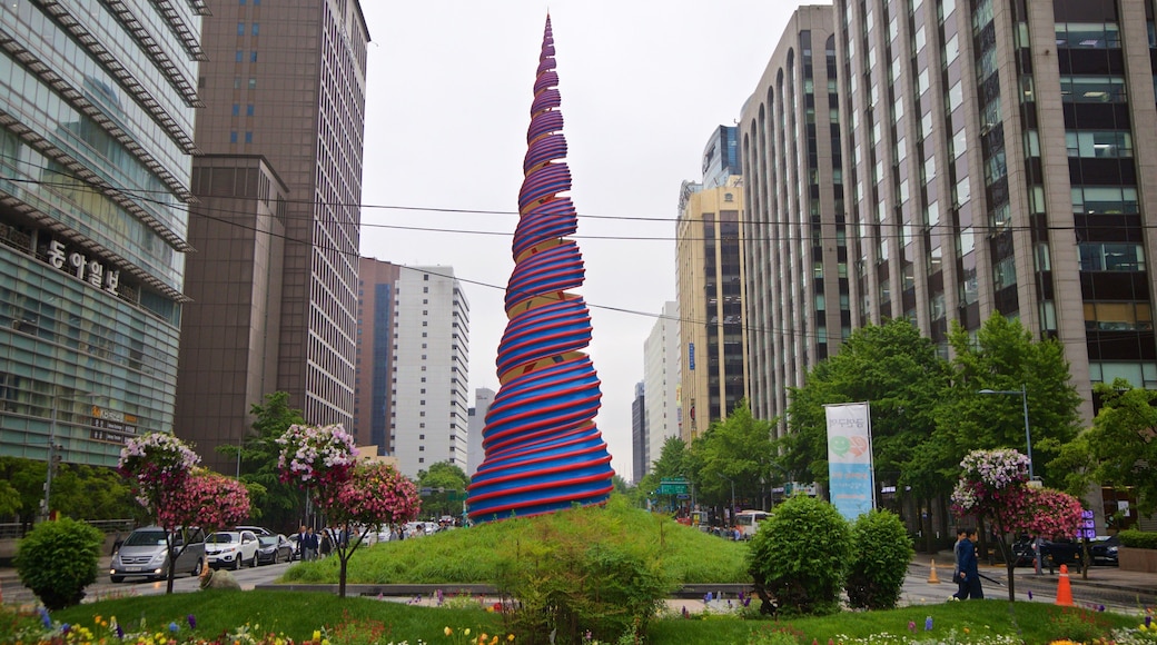 Cheonggye Plaza featuring a park, outdoor art and a city