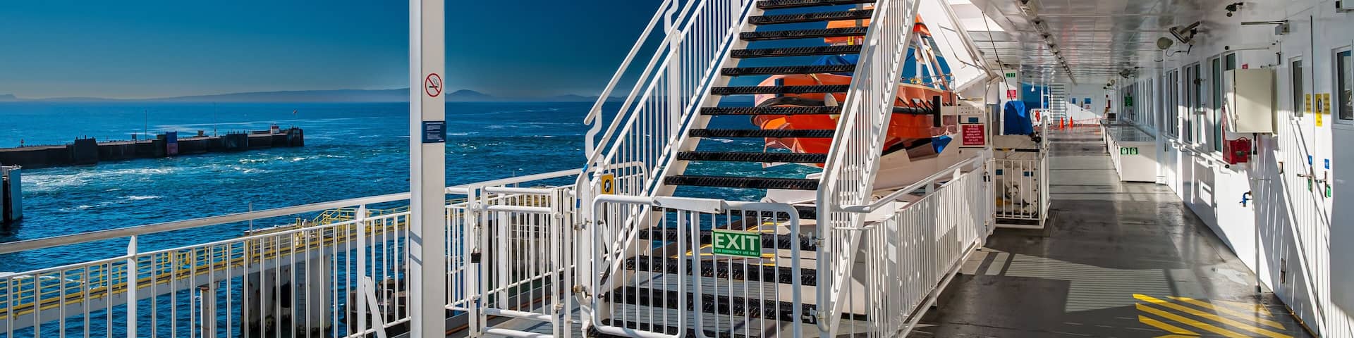 Stairwell to upper promenade deck aboard the BC Ferries MV Coastal Renaissance as it prepares to depart from Tswassen Terminal en route to Swartz Bay, Sydney, British Columbia, Canada.