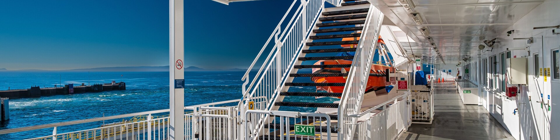 Stairwell to upper promenade deck aboard the BC Ferries MV Coastal Renaissance as it prepares to depart from Tswassen Terminal en route to Swartz Bay, Sydney, British Columbia, Canada.