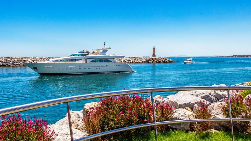 Luxury yacht enters Puerto Banus, Nueva Andalucia, Marbella, Province of Malaga, Andalusia Spain