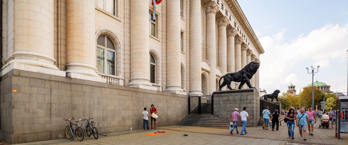 Sofia Court House showing street scenes, a statue or sculpture and heritage architecture