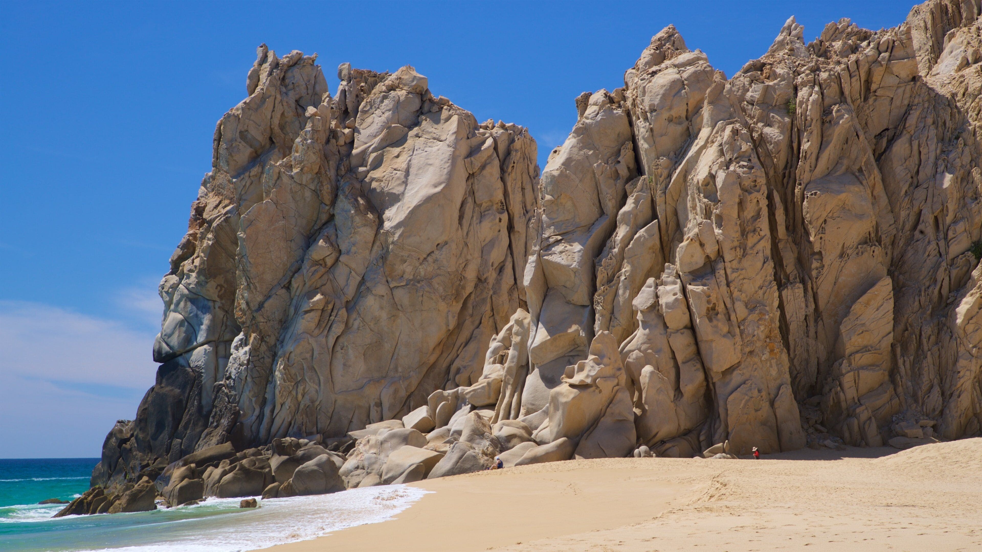 Divorce Beach featuring general coastal views, rocky coastline and a sandy beach