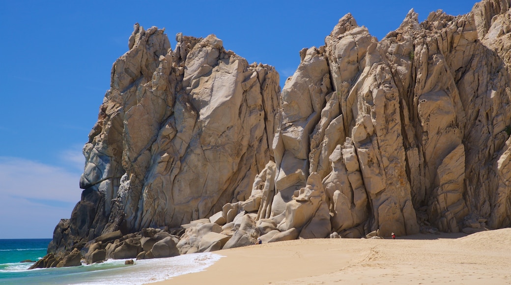Divorce Beach featuring general coastal views, rocky coastline and a sandy beach