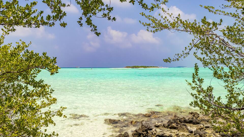 Natural tropical turquoise sandbank islands Madivaru Finolhu Rasdhoo Atoll Maldives.