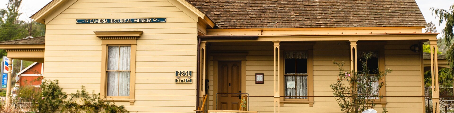 Cambria’s Historical Museum showing heritage elements, signage and a house