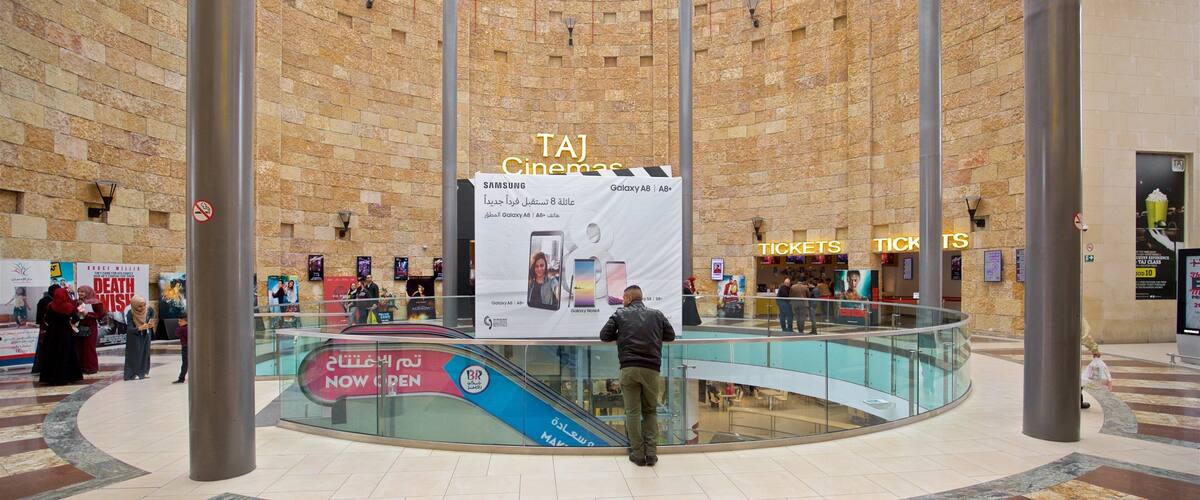 TAJ Mall showing interior views as well as an individual male