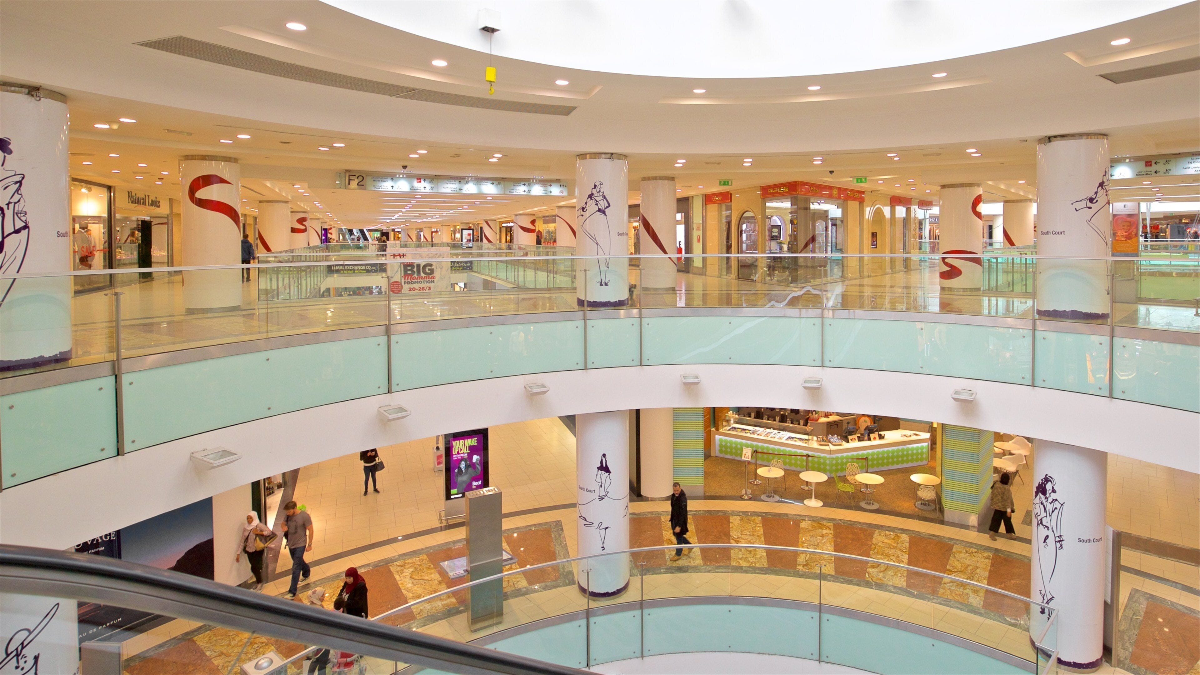 TAJ Mall featuring shopping and interior views