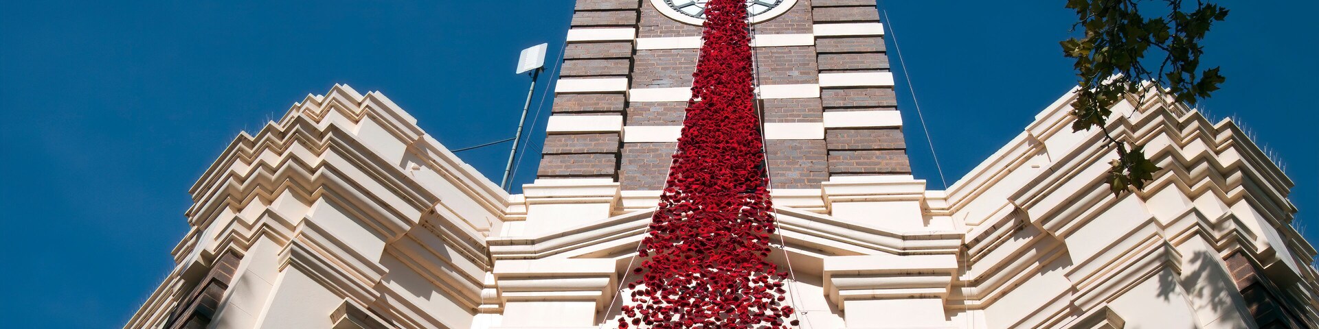 Narrandera Australia, Shire Council building with cascade of crocheted/knitted poppies for Anzac memorial services