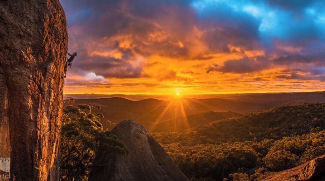 Tom Semple climbs New Paths (24) at Turtle Rock. Girraween N.P.
This shot, or one similar, had been planned for some time. New Paths had been a long time project for Tom and he was moving interstate the next week, so we went for it. We couldn't have asked for a better light show.