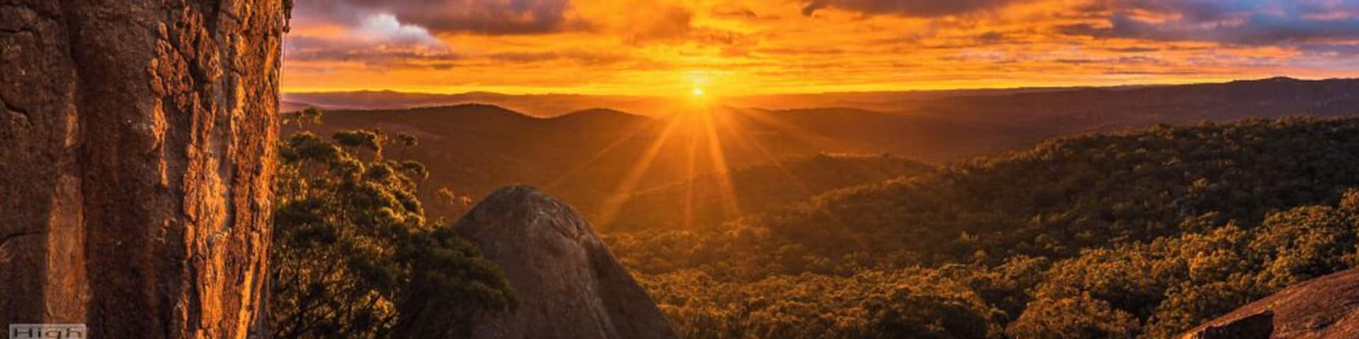 Tom Semple climbs New Paths (24) at Turtle Rock. Girraween N.P.
This shot, or one similar, had been planned for some time. New Paths had been a long time project for Tom and he was moving interstate the next week, so we went for it. We couldn't have asked for a better light show.