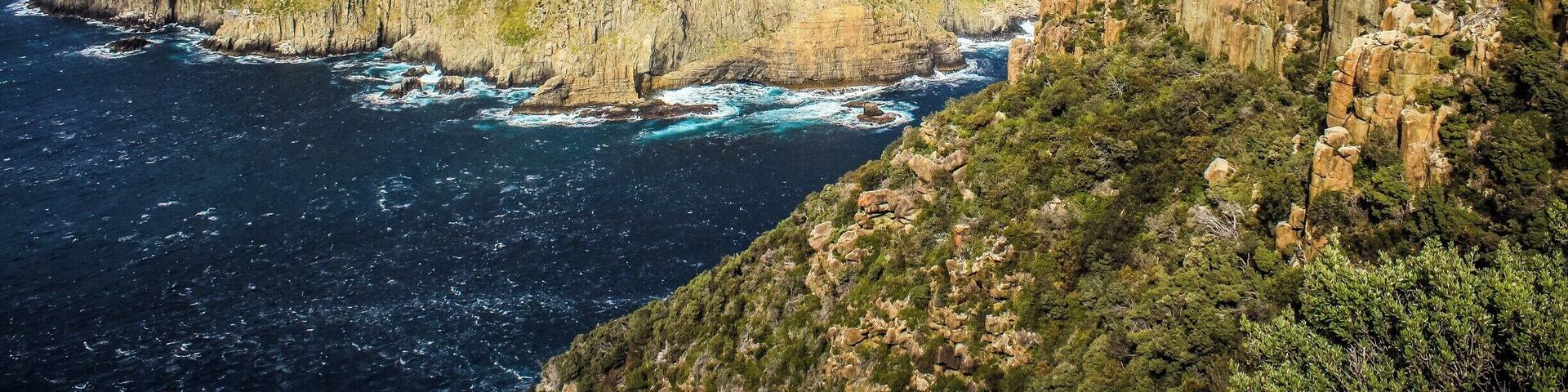 The Blade looking out at Tasman Island at the end of Cape Pillar in Tasmania. Such a beautiful view of all of the dolerite rock columns. #lifeatexpedia