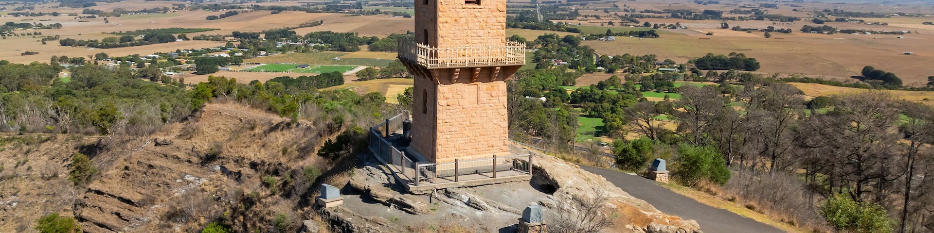 Lookout tower on top of a rocky hill top
