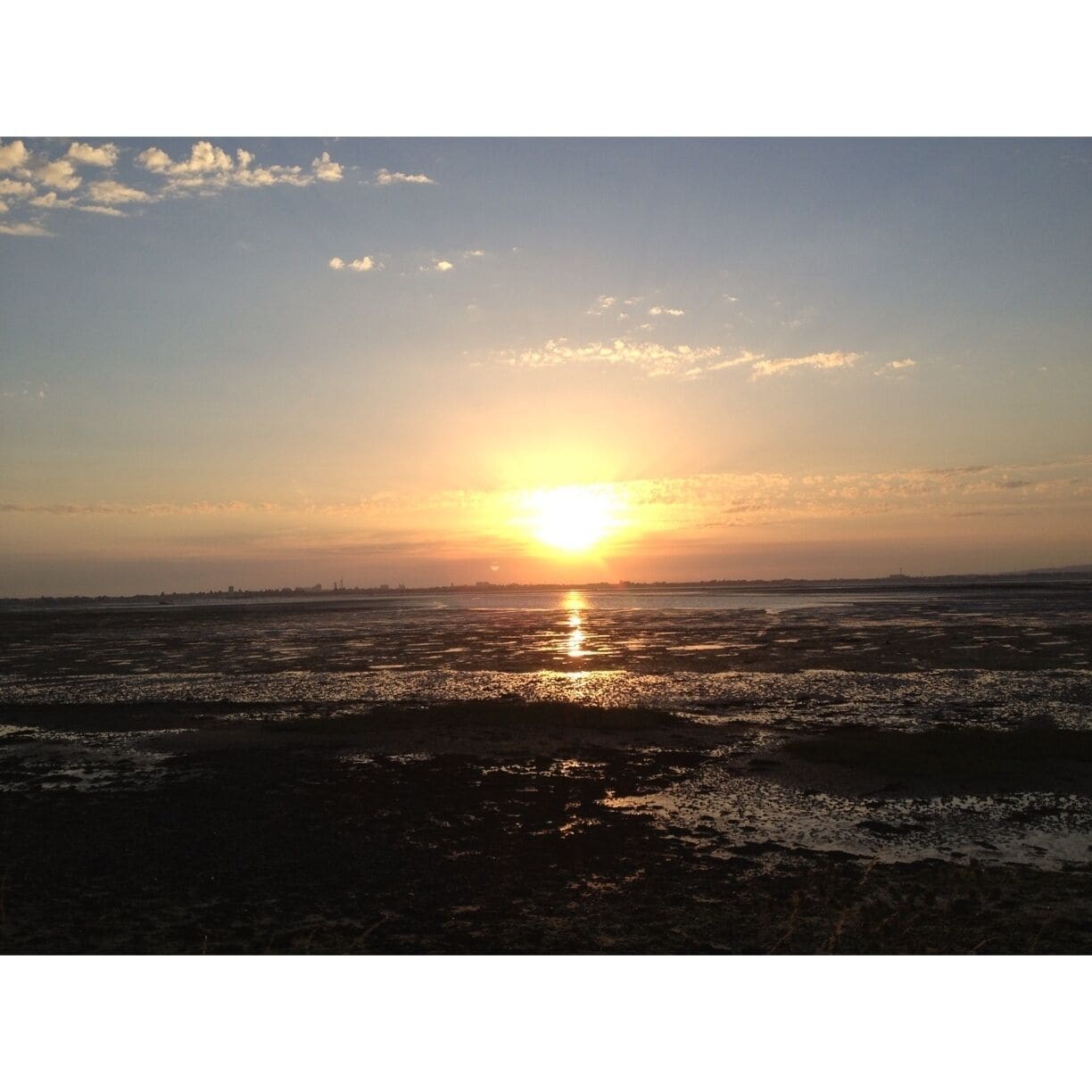 Taken from the Hayling Billy Line cross the mudflats to Portsmouth 