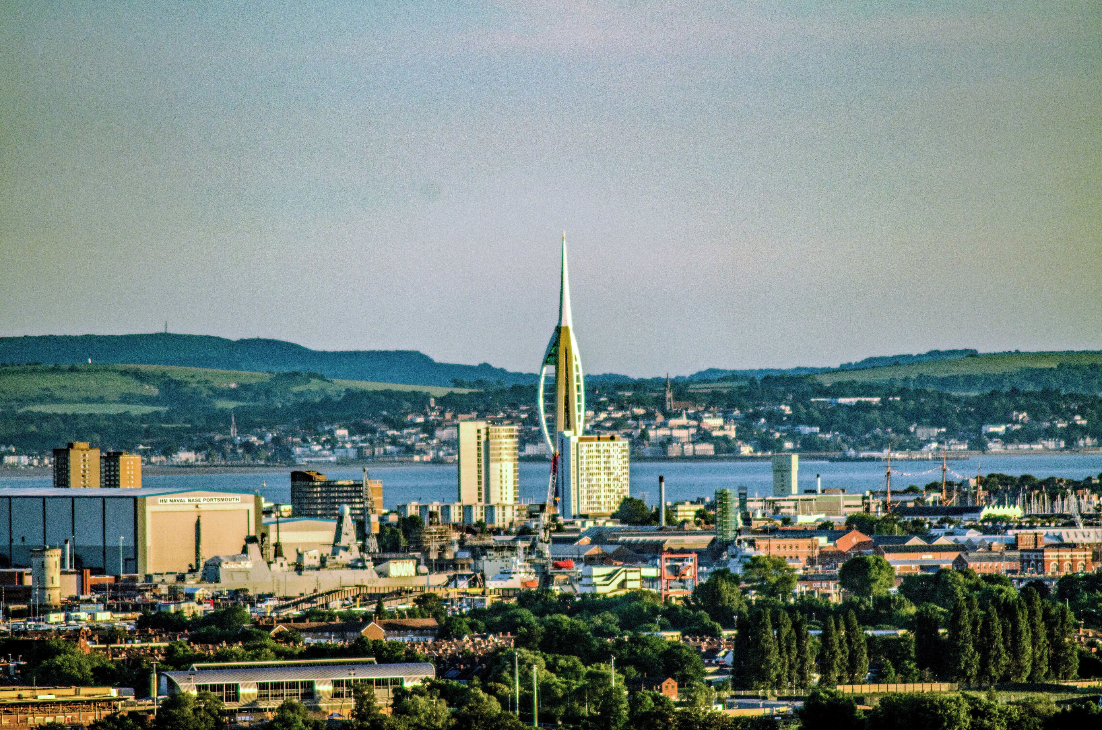 From the top of Portsdown hill you can see Portsmouth and the Spinnaker Tower. Beyond the Solent separates the Isle of Wight from the British mainland.