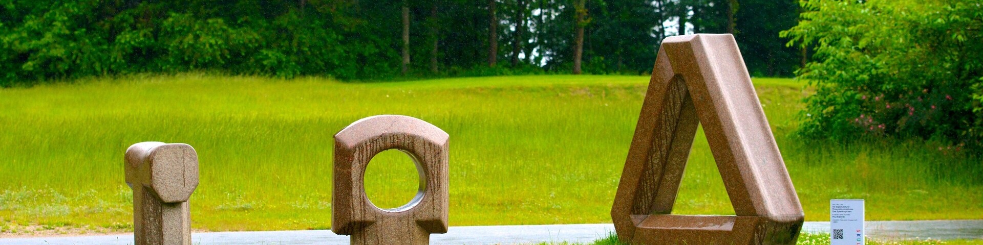 Denmark showing outdoor art and a garden