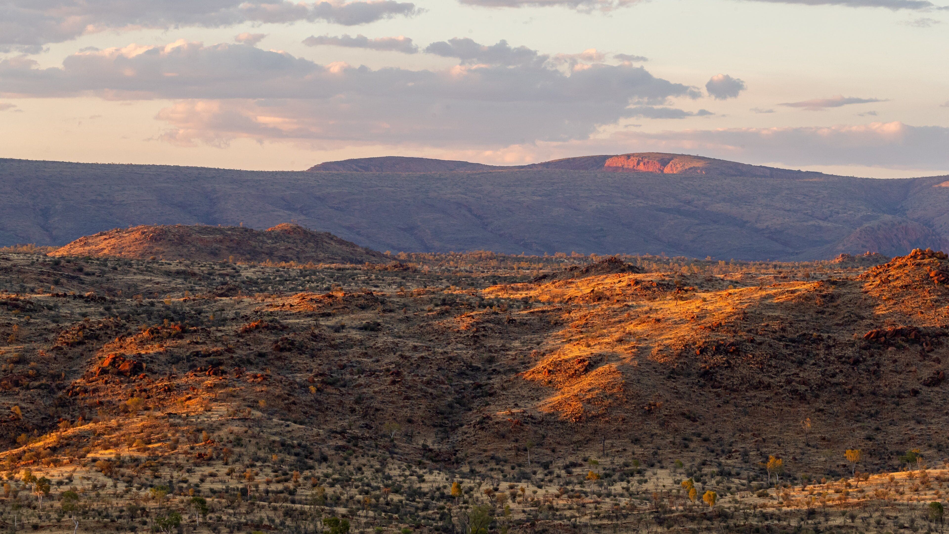 Trephina Gorge National Park featuring desert views, landscape views and a sunset