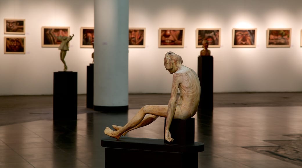 Cuyo - Wine Region showing a statue or sculpture and interior views