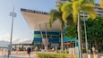 A modern building with a large sign reading "REEF FLEET Terminal."