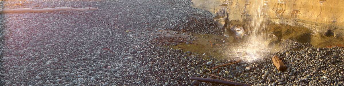 Sooke showing a pebble beach and a sunset