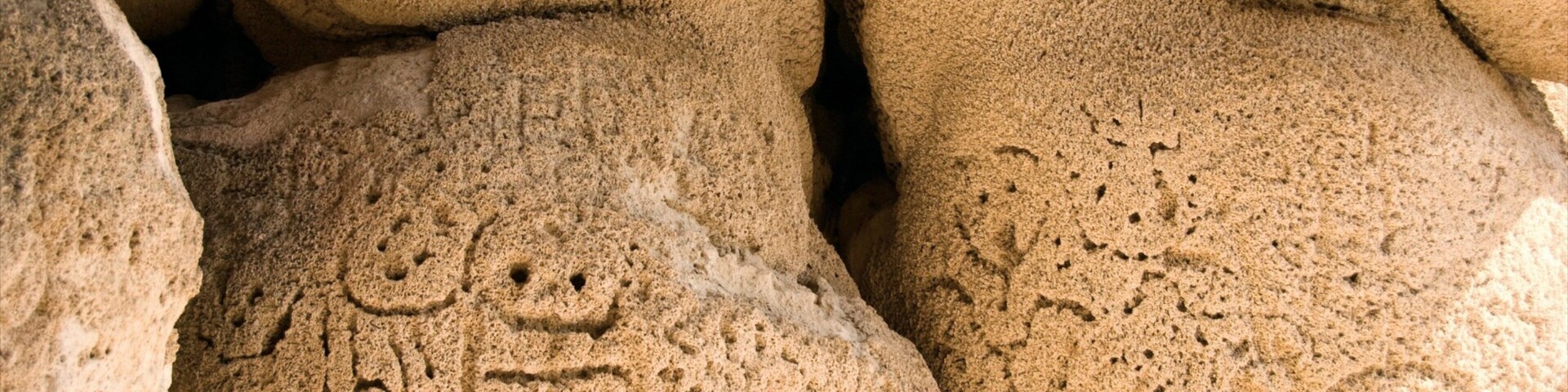 Las Caritas featuring outdoor art