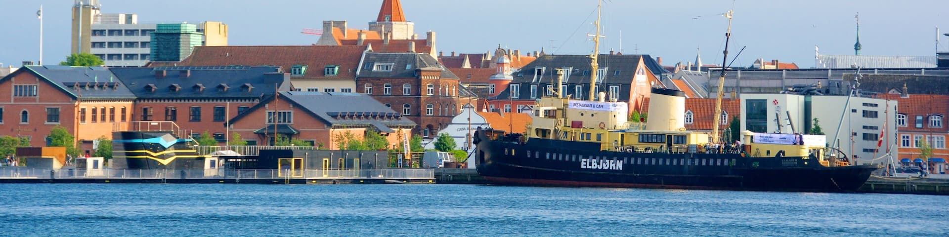 Aalborg which includes a coastal town, boating and a bay or harbor