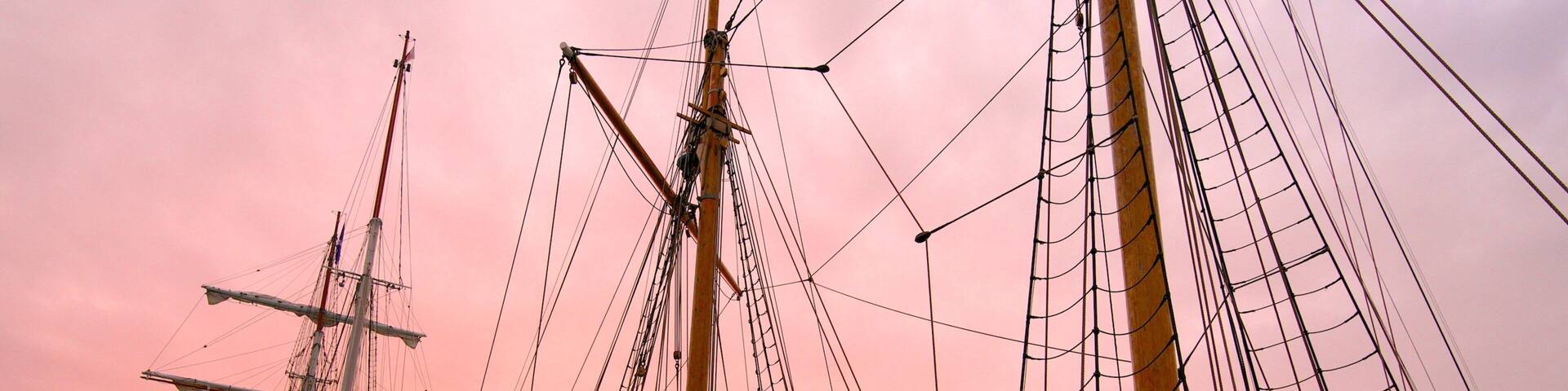 Aalborg which includes a sunset, a bay or harbor and boating