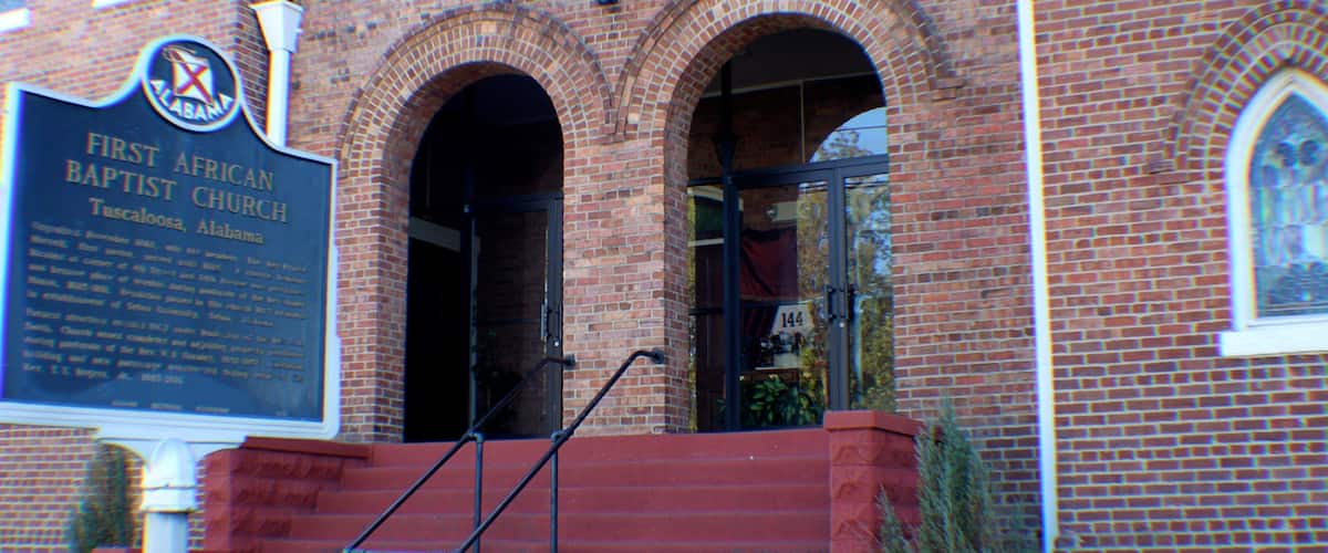 Tuscaloosa showing a church or cathedral and signage