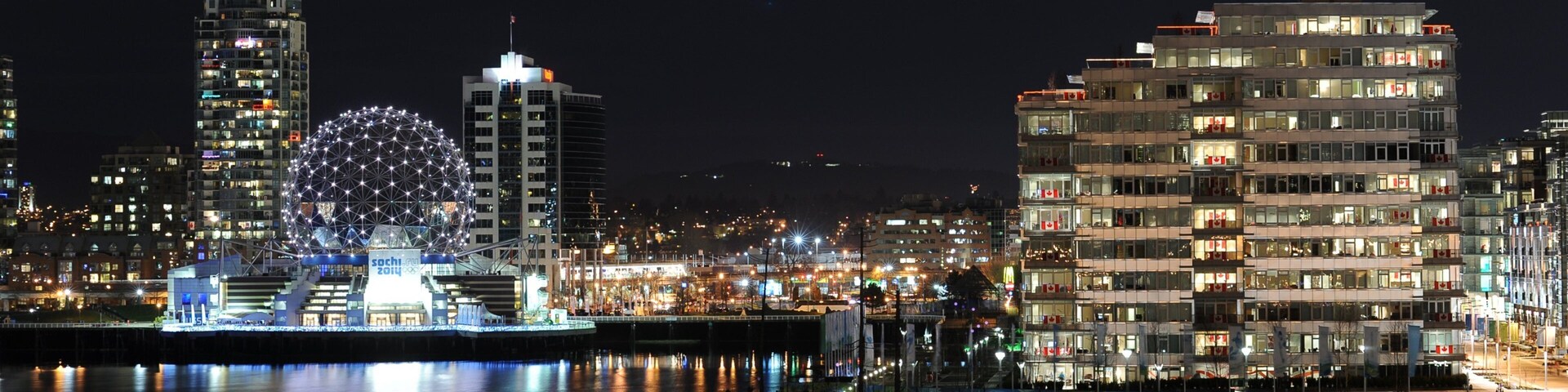 Vancouver showing a high rise building, modern architecture and a city