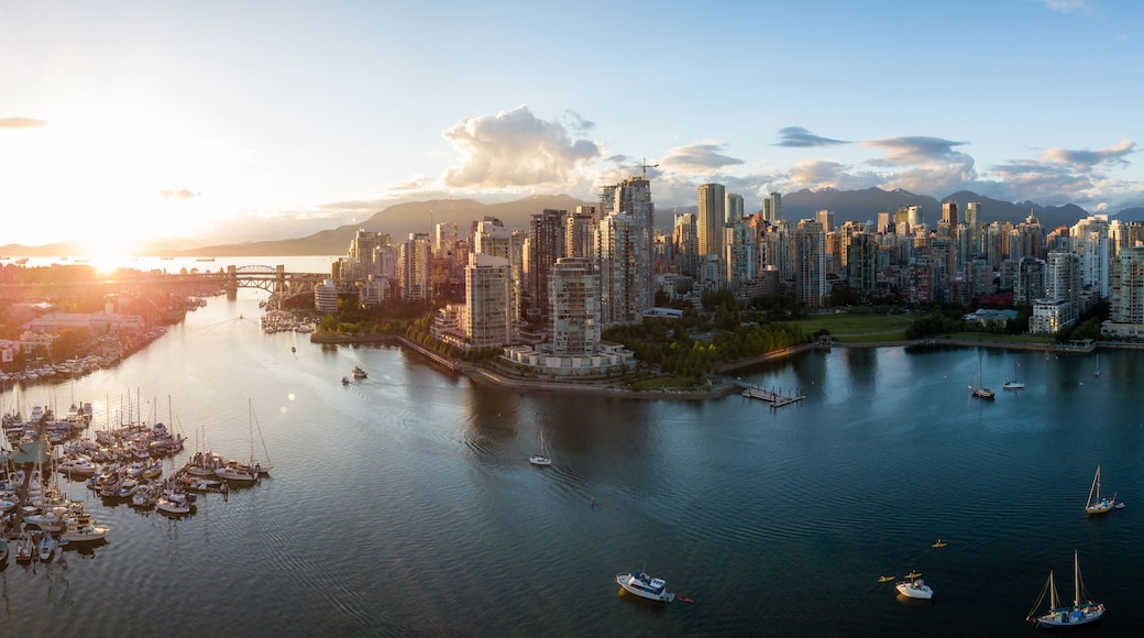 Aerial Panorama of Downtown City at False Creek, Vancouver, British Columbia, Canada. Taken during a bright sunset.