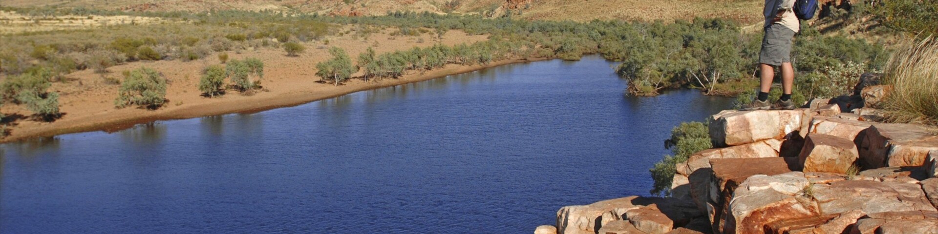 Red Centre featuring hiking or walking, tranquil scenes and a river or creek