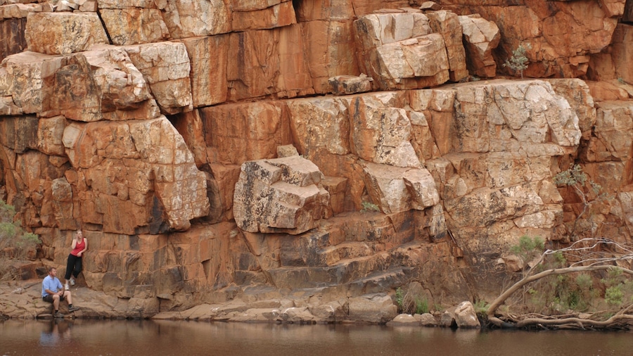 Red Centre which includes hiking or walking, a lake or waterhole and a gorge or canyon