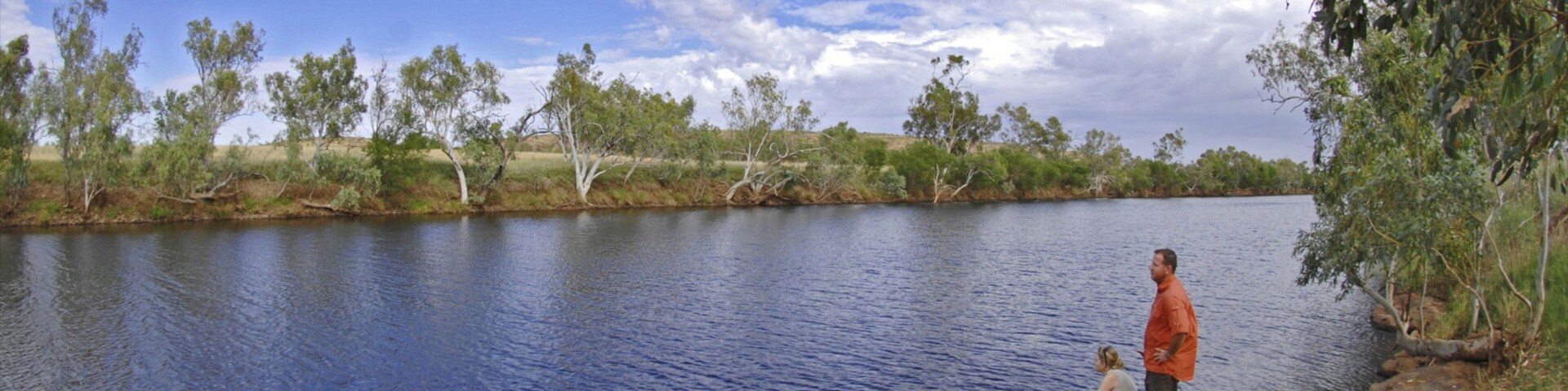 Red Centre featuring hiking or walking and a river or creek as well as a couple