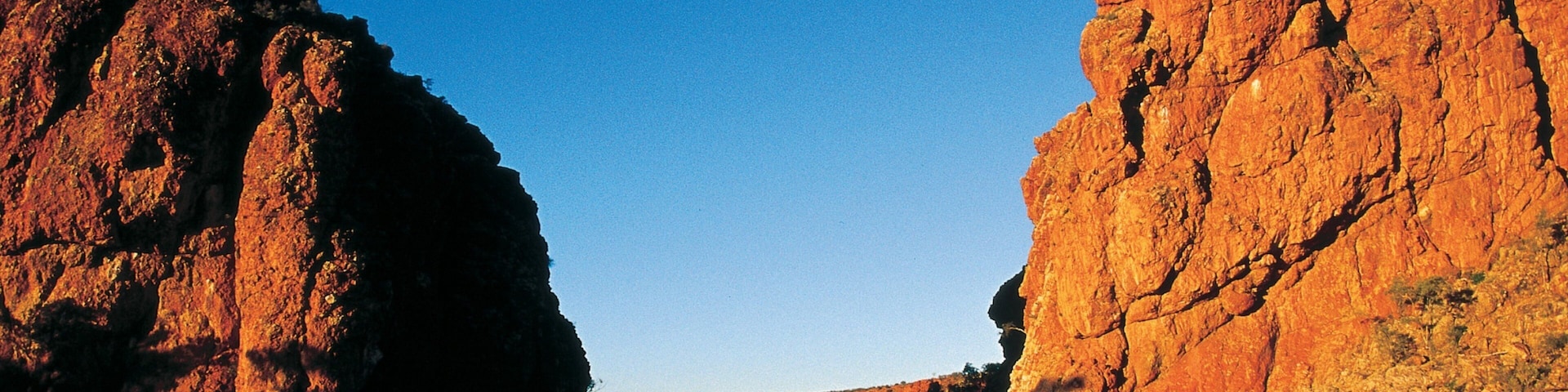 Red Centre showing a sunset, a river or creek and a gorge or canyon