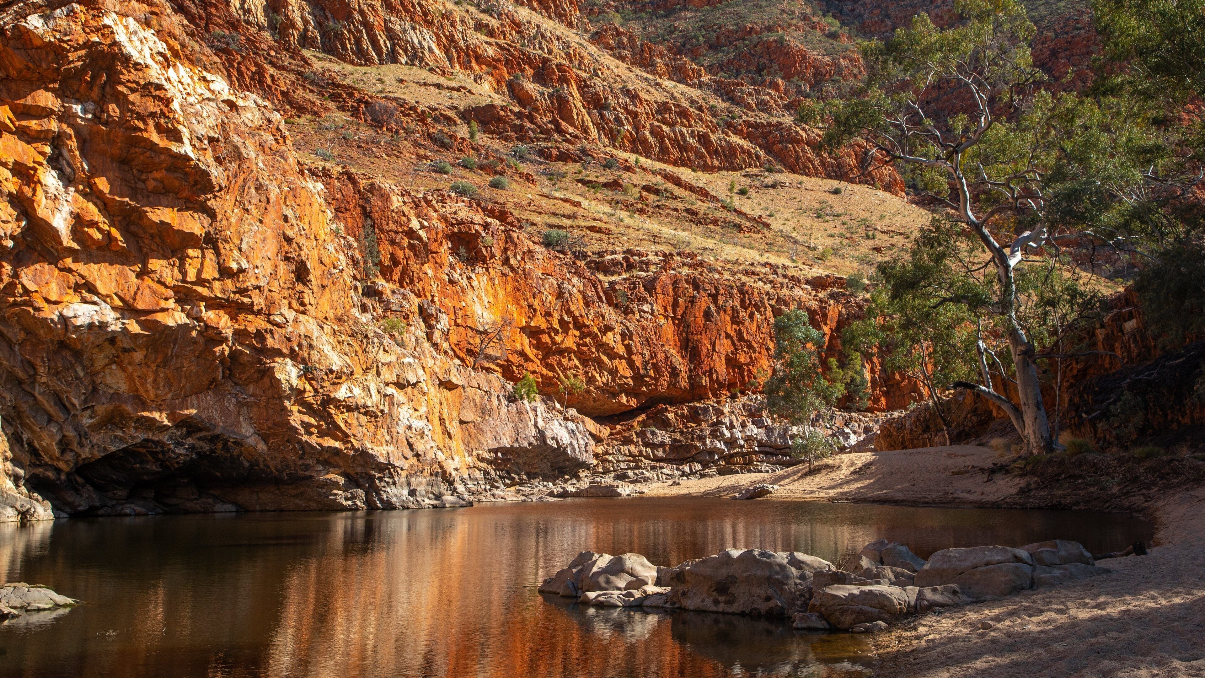 Ormiston Gorge which includes a lake or waterhole and a gorge or canyon