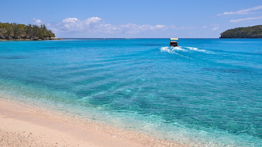 Vanuatu som viser båter, strand og kyst