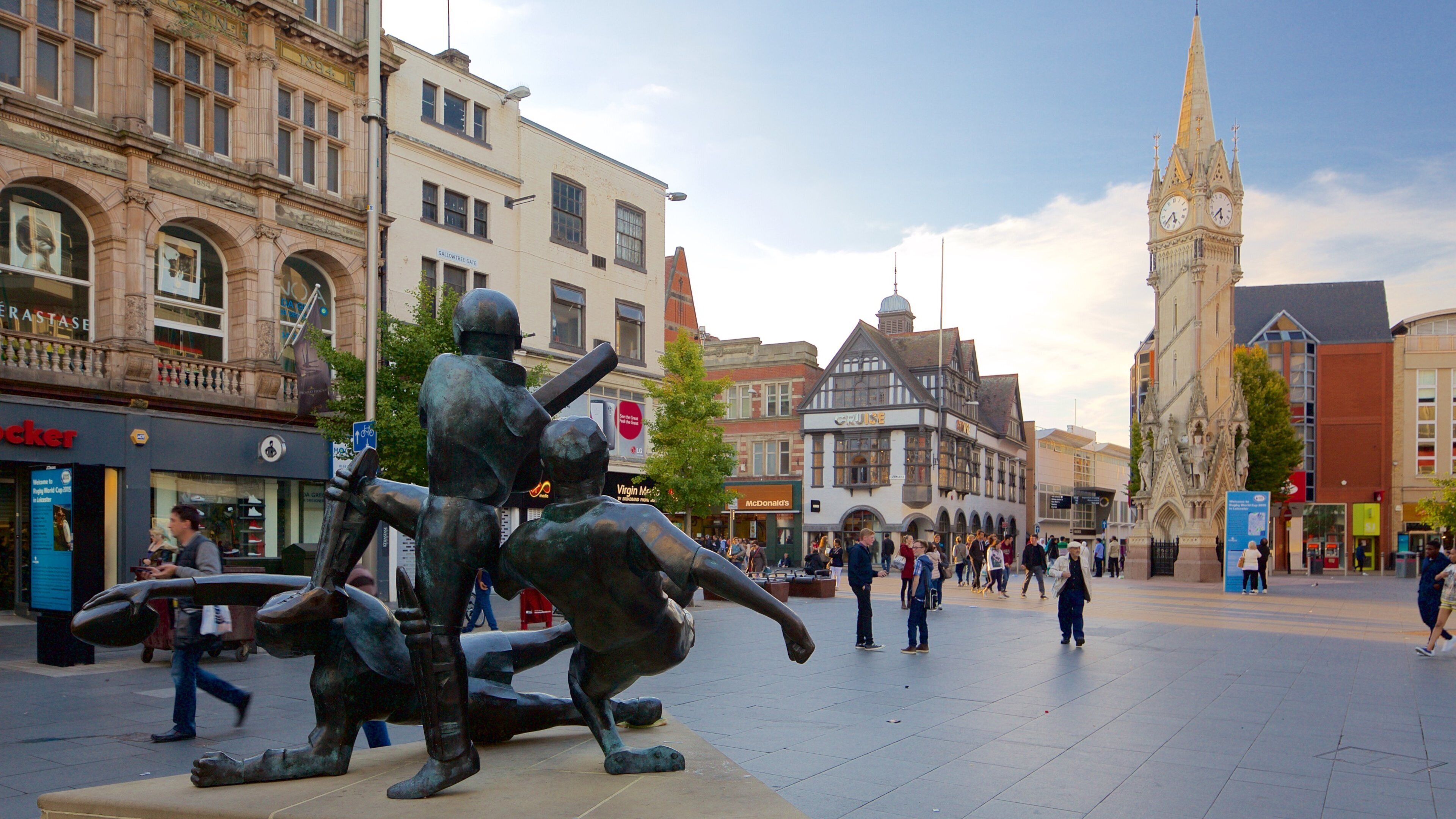 Haymarket Memorial Clock Tower which includes a square or plaza, a statue or sculpture and a monument