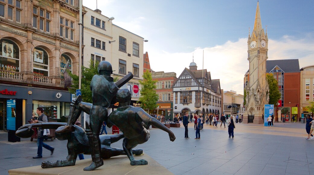 Haymarket Memorial Clock Tower which includes a square or plaza, a statue or sculpture and a monument