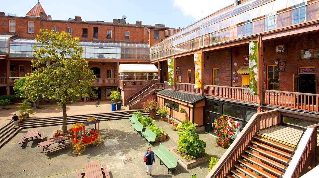 Victoria ofreciendo una casa, escenas urbanas y una ciudad