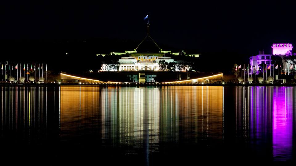Canberra Skyline with a reflection in the waters of Lake Burley Griffin.