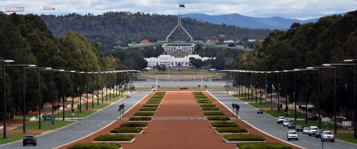 Canberra, Australia - March 18, 2017. Anzac Parade running from The Australian War Memorial in direction of Parliament House, Canberra. View of Anzac Parade and Parliament House in Canberra, Australia
