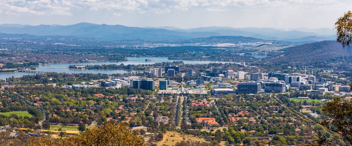 View of Canberra from Mount Ainslie lookout - ANZAC Parade leading up to the Parliament and modern architecture. ACT, Australia