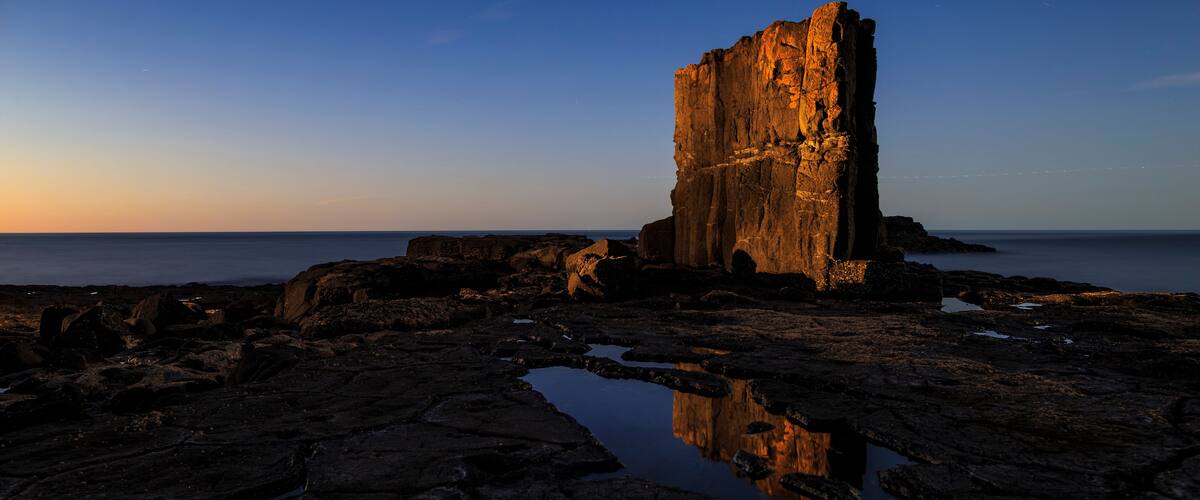 Sunset lighting up volcanic rock feature at Don Heads, near Devonport.