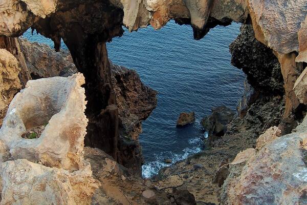 I then lay awake for the rest of the night, awaiting a sunrise that also turned out to be mediocre so I thought I’d check out the cliffs and, how easy did that turn out to be.
Around the lighthouse area is the Pupulong Walk Trail and it skirts the cliffs, offering views of landscapes that are perfectly described by the adjective “bizarre”.
Undercuts with abstract natural designs and caves carved in inconceivable shapes are there for the viewing.
The walk, from Tookalup, where there are toilets, to Point D’Entrecasteaux is only 1.3 kilometres long and it’s on freshly laid bitumen. There are many warnings about not risking the cliff edges but past trails indicate that some have ignored them.
Other older established walks on a gravel base lead off in other directions but I chose not to be diverted this time. Instead, I opted for nearby Salmon Beach where the road sign said “Not suitable for caravans and buses”.
The way in however, was newly sealed road and easy, though curvy, driving. It’s the carpark where there’s a problem because the turning circle would definitely make life difficult if you were towing something.
It’s from here that you take the short stroll across the dunes to this pristine beach.
This is the sort of place I can tarry for hours, feeling the soft grains squeeze up between my toes as I stroll along white sands towards the dominant ramparts of headlands to the west.
You feel like you want to walk forever, past occasional sandstone outcrops while the offshore breeze stands up the crystal clear waters before the swell collapses in a foamy white display near the shore.
Beside you the grass of the dunes is ruffled by the wind and the occasional grain of sand rolls down off the top. The only other people are an odd fisherman or two and they are only too happy to have a chat.
Western Australia offers many such experiences like this, may I recommend you go out and get yourself one.
#Nature
