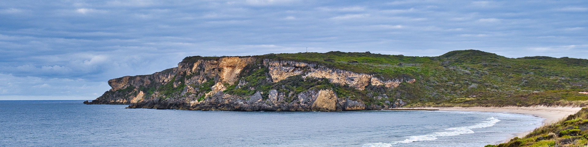 Coastal scenery: bay with deserted beach and high limestone cliffs. Cathedral Rock Beach, Windy Harbour, shire of Manjimup, south coast of Western Australia