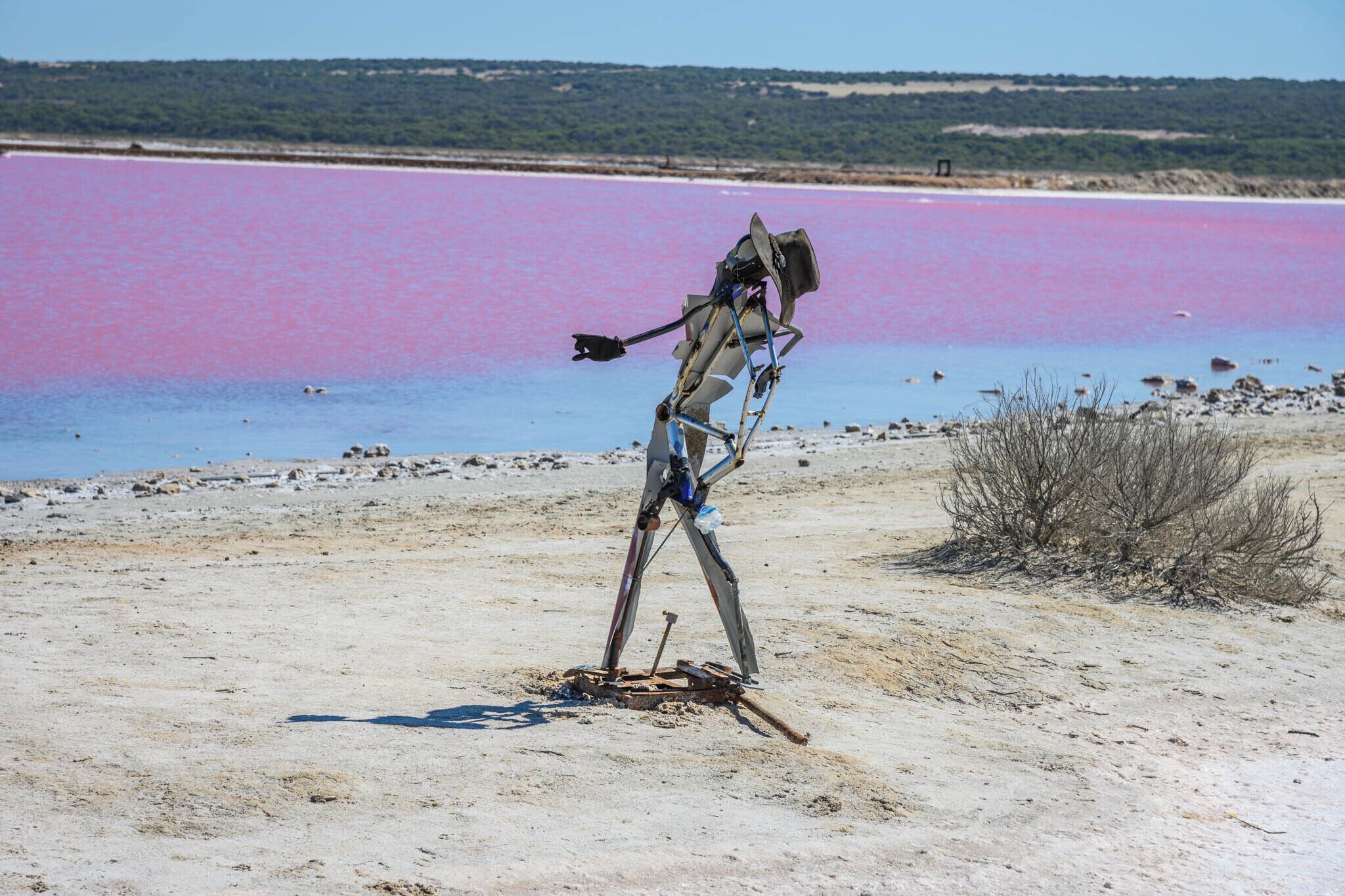 The poor fella must be getting tired pointing to the pink salt lake situated just outside of Port Gregory.