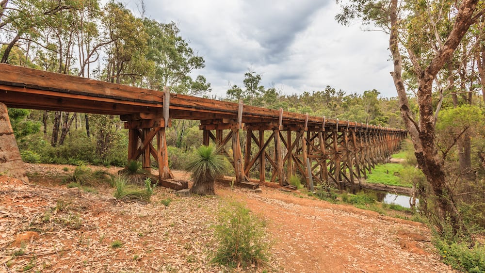 Bibbulmun Track, Long Gully Bridge, Lower Hotham, Western Australia, Australia, 12 december 2011: Historic bridge over the Murray River destroyed by Lower Hotham forest fire February 2015