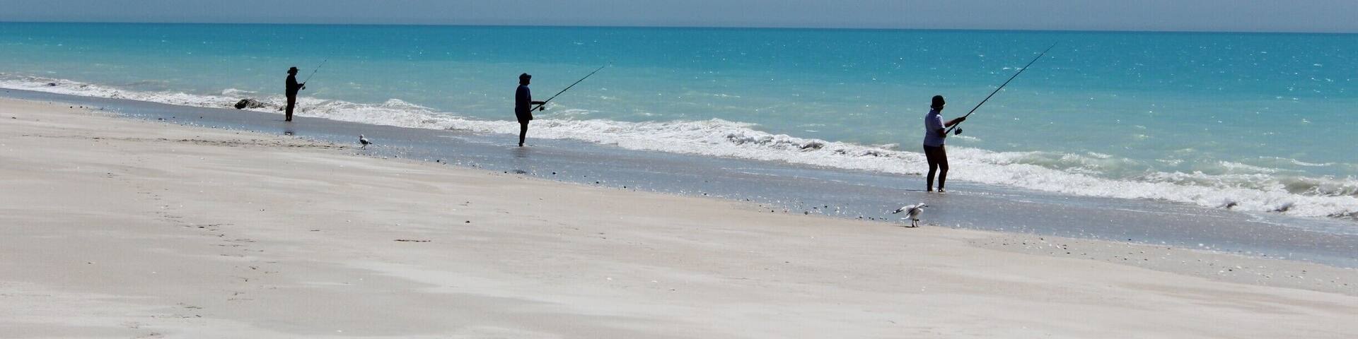 You don't need a 4x4 to drive the long dirt road, but it's a bumpy ride! The turquoise waters at the end make it worth while. Fishermen line the beach, but be careful if you swim - I saw a shark in the shallows as I sunbathed!
#BeachBound
