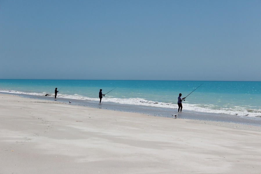 You don't need a 4x4 to drive the long dirt road, but it's a bumpy ride! The turquoise waters at the end make it worth while. Fishermen line the beach, but be careful if you swim - I saw a shark in the shallows as I sunbathed!
#BeachBound