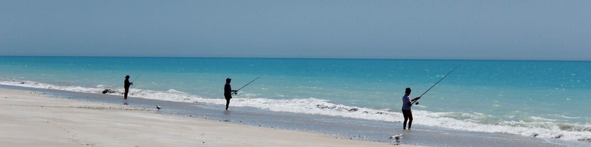 You don't need a 4x4 to drive the long dirt road, but it's a bumpy ride! The turquoise waters at the end make it worth while. Fishermen line the beach, but be careful if you swim - I saw a shark in the shallows as I sunbathed!
#BeachBound